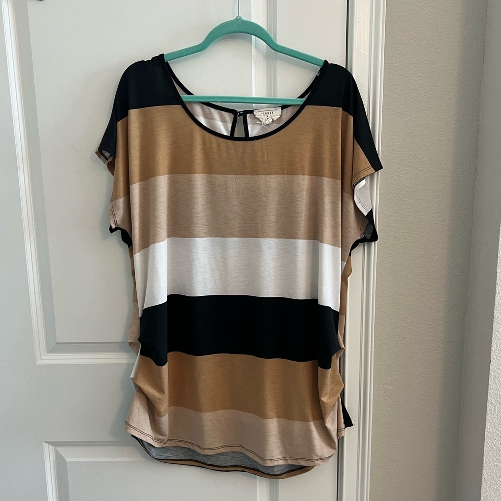 Black, brown, and white blouse.
